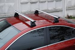 Багажник LUX на а/м со штатными местами с аэродинамическими дугами